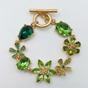 Óscar de la Renta flower in green rhinestones